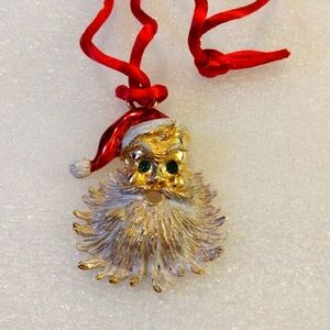 Vante Santa face pendant on rope string necklace.